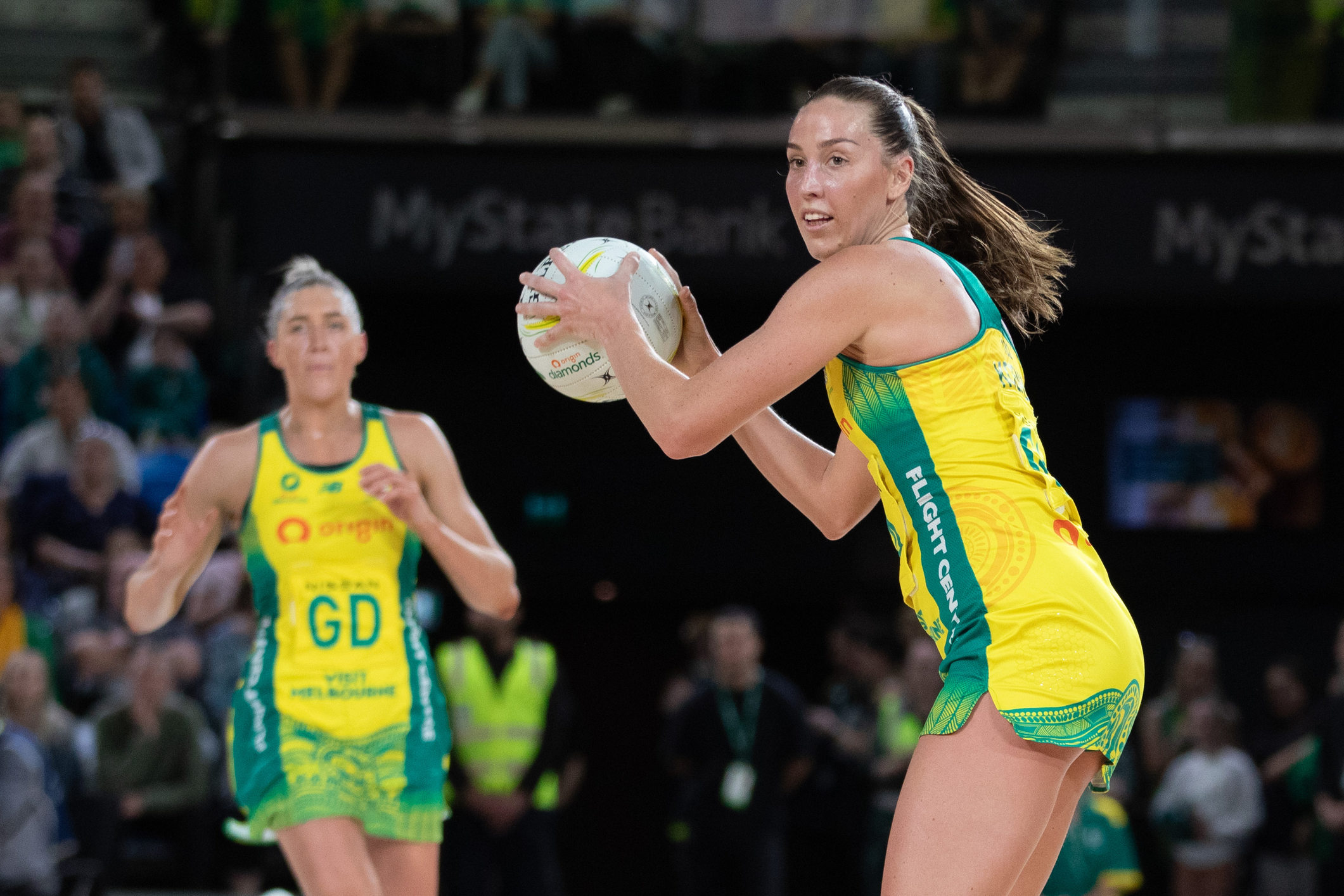 Cara Koenen looks to pass during a game for Australia.