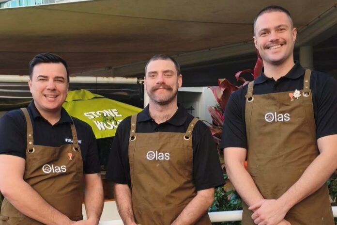 Olas Beach House head chef Angelo Puelma, with front-of-house managers Thomas Ring and Jack Quinn. Picture: Supplied