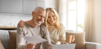 Shutterstock picture of elderly couple in front of laptop