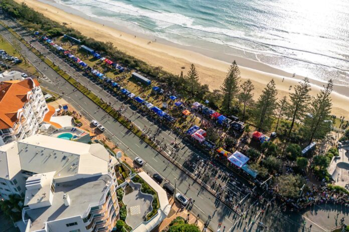 Runners on the Sunshine Coast Marathon course, by the beach, pictured from 2024.