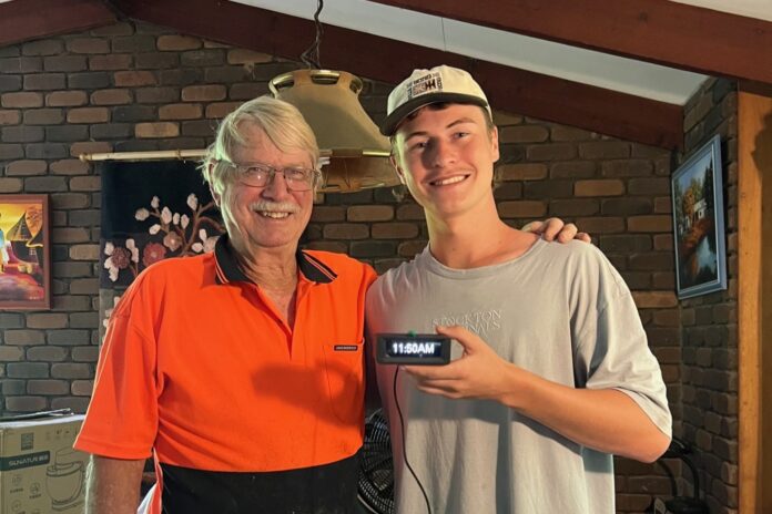 Kai Gould (right) with grandfather, Brett.