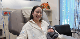 Mother, Jya Banks in hospital with her baby son, Harvey.