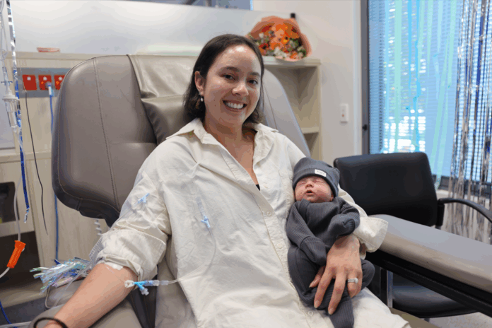 Mother, Jya Banks in hospital with her baby son, Harvey.