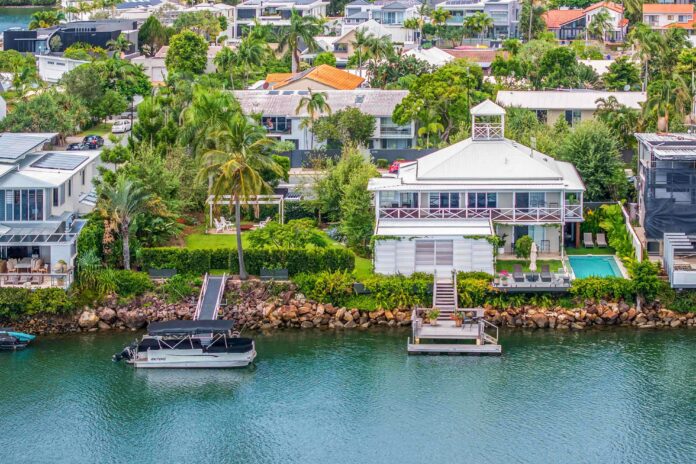 32 Noosa Parade (land) and 34 Noosa Parade to the right.