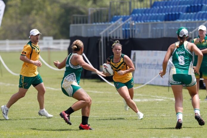 Cassie Vincitorio running with the ball during a touch game.