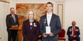 Governor of Queensland and Patron of the Royal Humane Society of Australasia Jeanette Young with bravery award recipient Zayde Taylor.