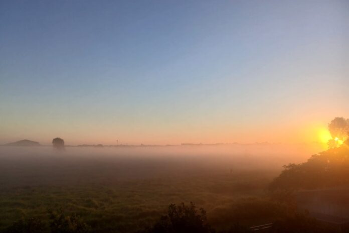 Photographer Peter Eaton sunrise over fields Bli Bli