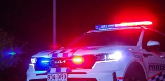 A police car at night.