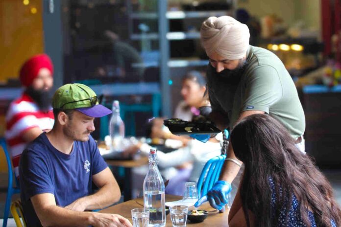Customers being served at Tadka Indian restaurant.