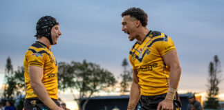 Sunshine Coast Falcons celebrate after a try.