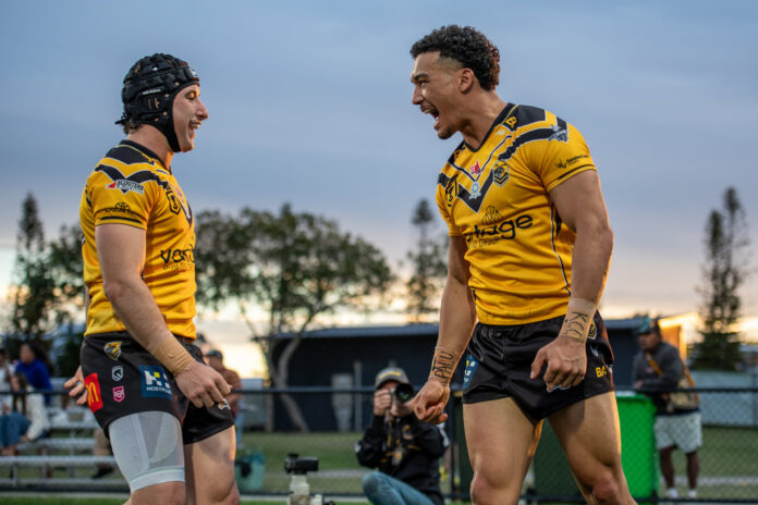 Sunshine Coast Falcons celebrate after a try.