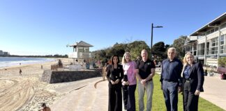 Dignitaries at the opened stretch of seawall.