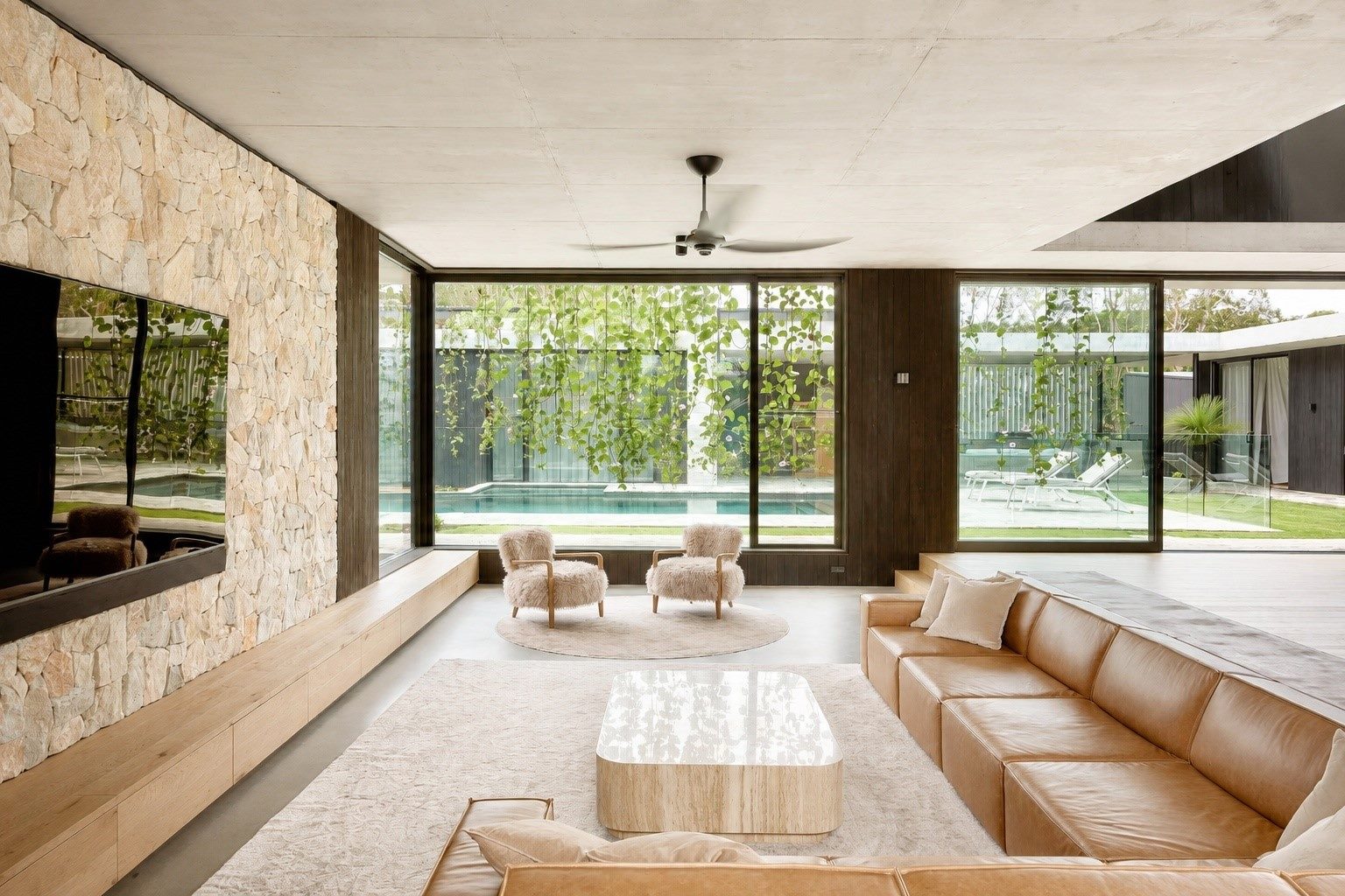 Contemporary styling is evident throughout, down to the chic soft furnishings.