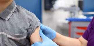A boy is being vaccinated