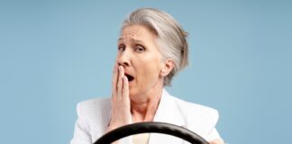 elderly woman drive in shock shutterstock
