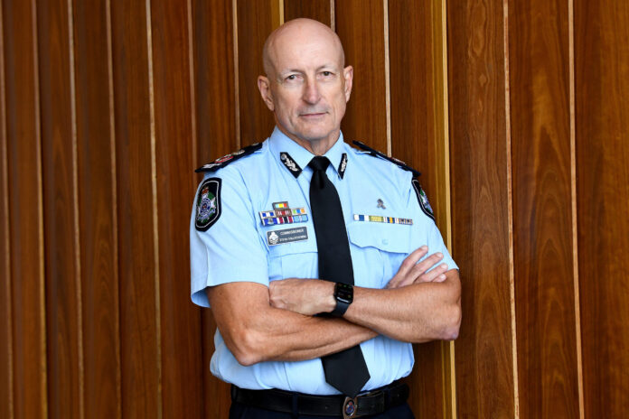 Steve Gollschewski with arms crossed for a photo shoot.