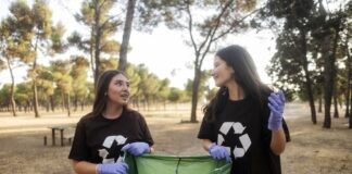 a couple of Gen Z women collecting rubbish