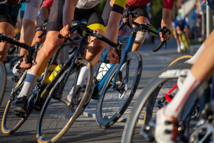 A close up of bike wheels in a race.