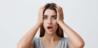 a forgetful looking woman from Shutterstock