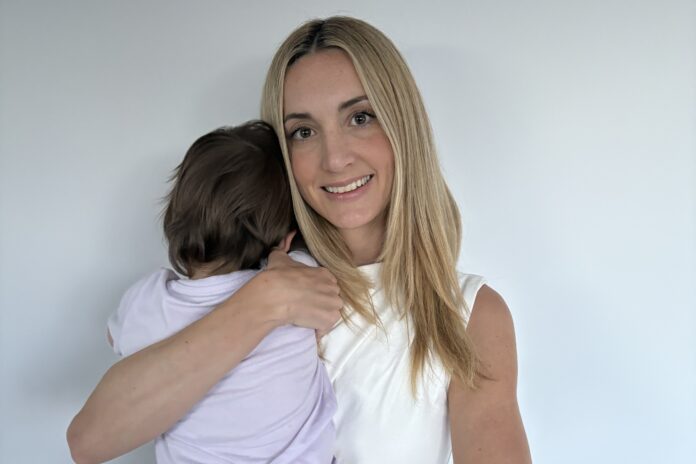 Sophie with her daughter, as she awaits an au pair visa.