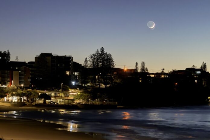Photographer Lesley Evans pre-dawn waning crescent moon over Kings Beach