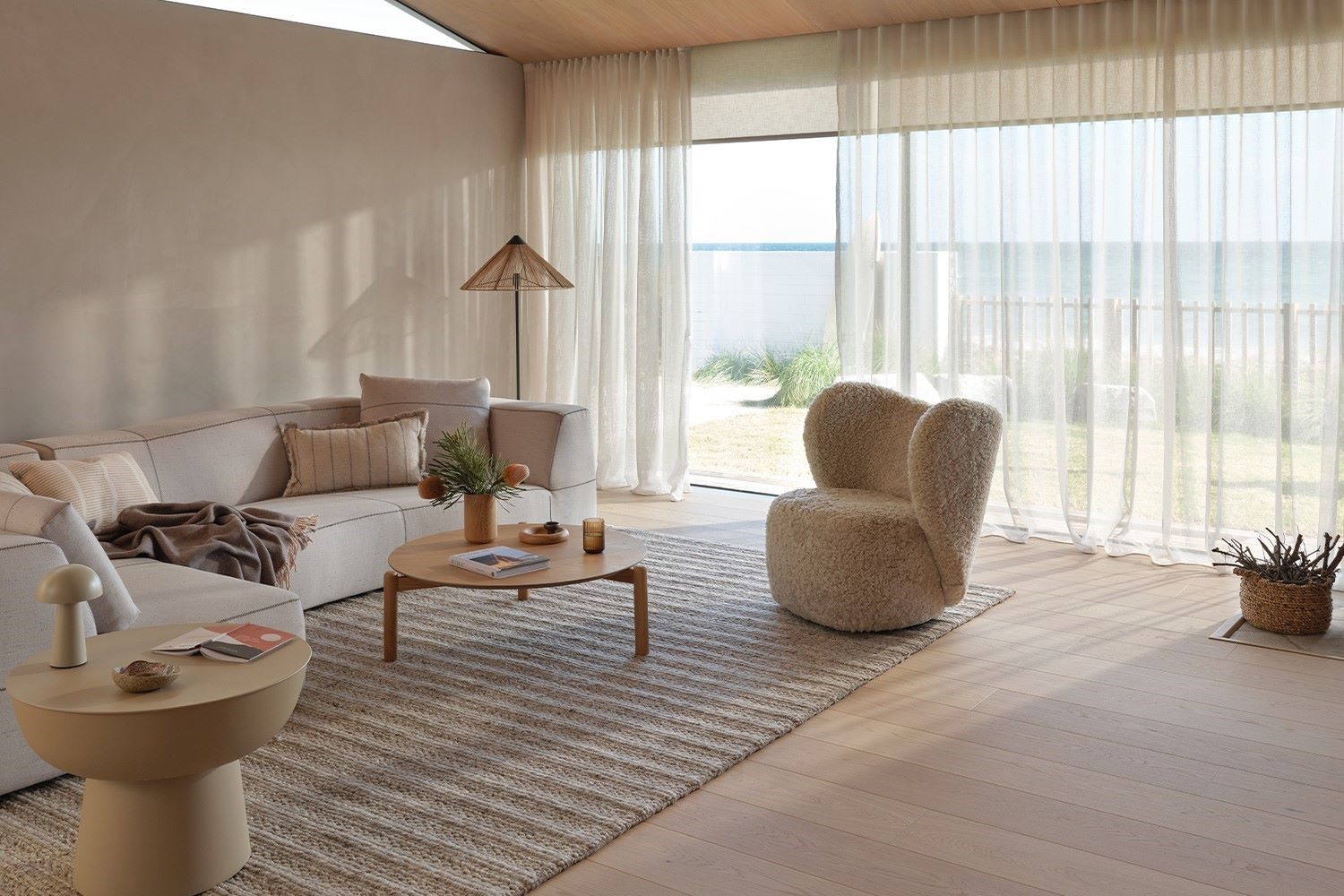 Sheer carpet Court blinds in a lounge room