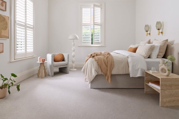 White window shutters in a master bedroom.