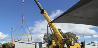 Cranes work on the new accommodation development at the Currimundi Hotel.