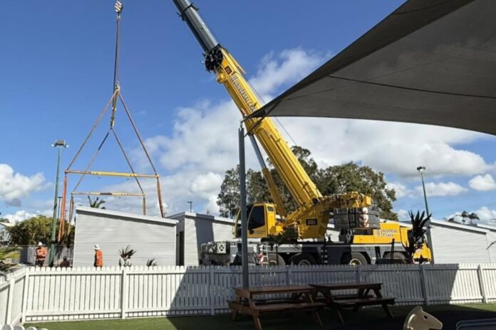 Cranes work on the new accommodation development at the Currimundi Hotel.