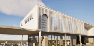 Artist's impression of a modern two-storey timber batten and brick building.