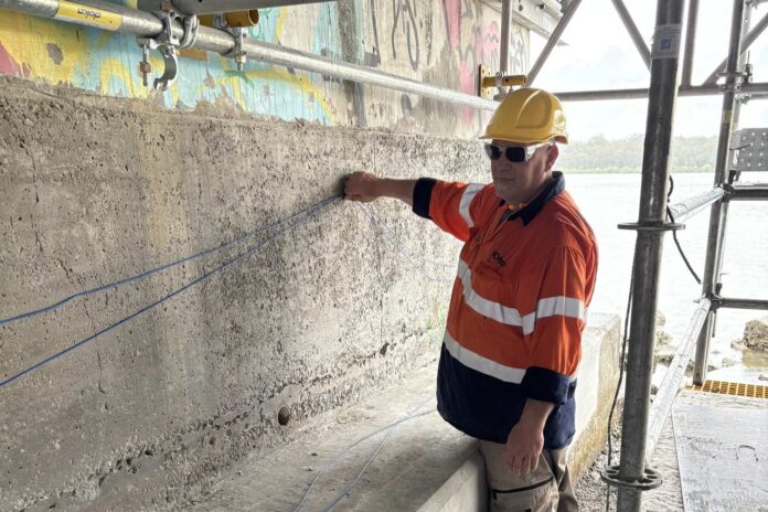 Enzo Ferracane works on the chloride extraction process at Doonella Bridge.
