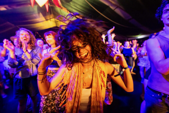 People dancing at the Woodford Folk Festival.