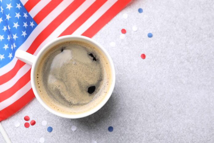 The American flag and a cup of black coffee