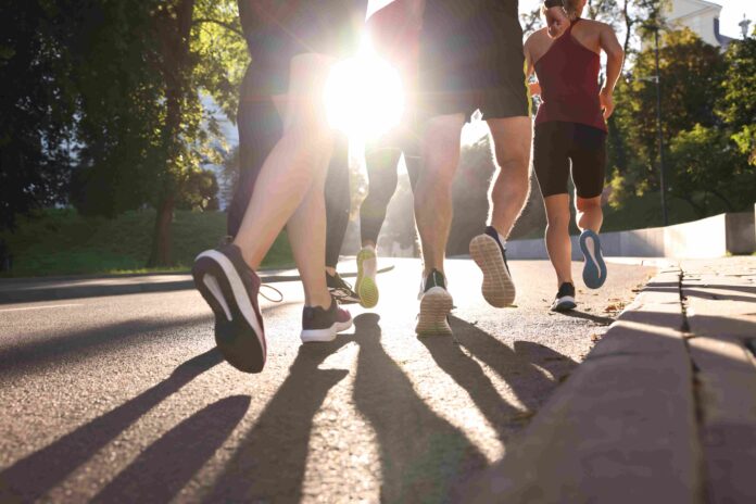 A group of people running. Shutterstock
