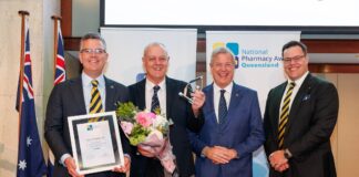 Pharmacy Guild of Australia president Professor Trent Twomey,Tim Fitzpatrick, accepting the award on behalf of his son Sean, Minister for Health and Ambulance Services Tim Nicholls and Pharmacy Guild of Australia, Queensland, president Chris Owen