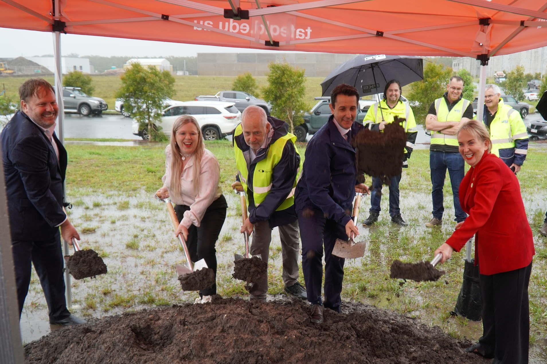 Premier David Crisafully takes part in the turning of the sod for the new TAFE centre at Caloundra.
