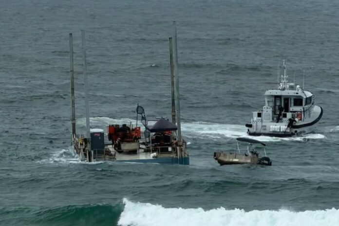 The vessel assisted by water police off the coast of Point Cartwright. Picture: alexheadsurfreport.
